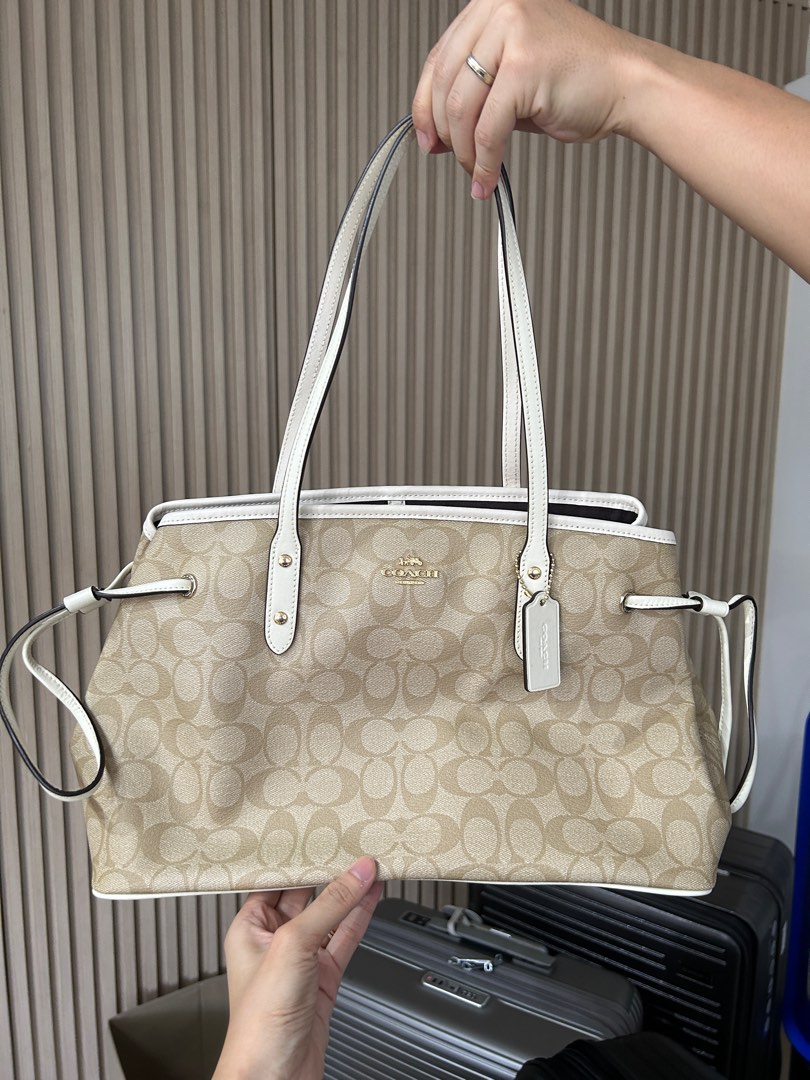 Coach signature drawstring tote hotsell