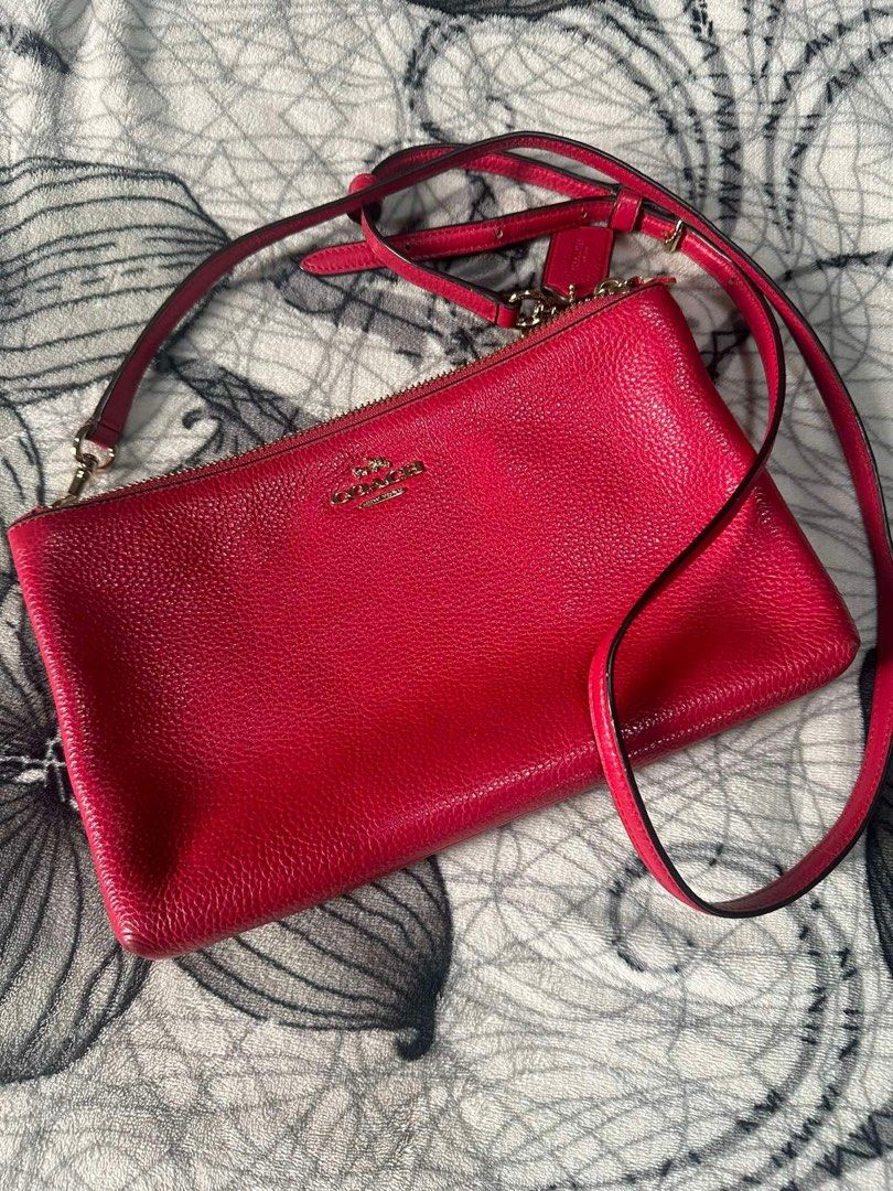 Coach sling bag red authentic (Category: Cross-body Bags) located in Morong. Submitted by deegee1234 (Listing ID 1322319737, Image 3). Description: Last price posted Guaranteed authentic.