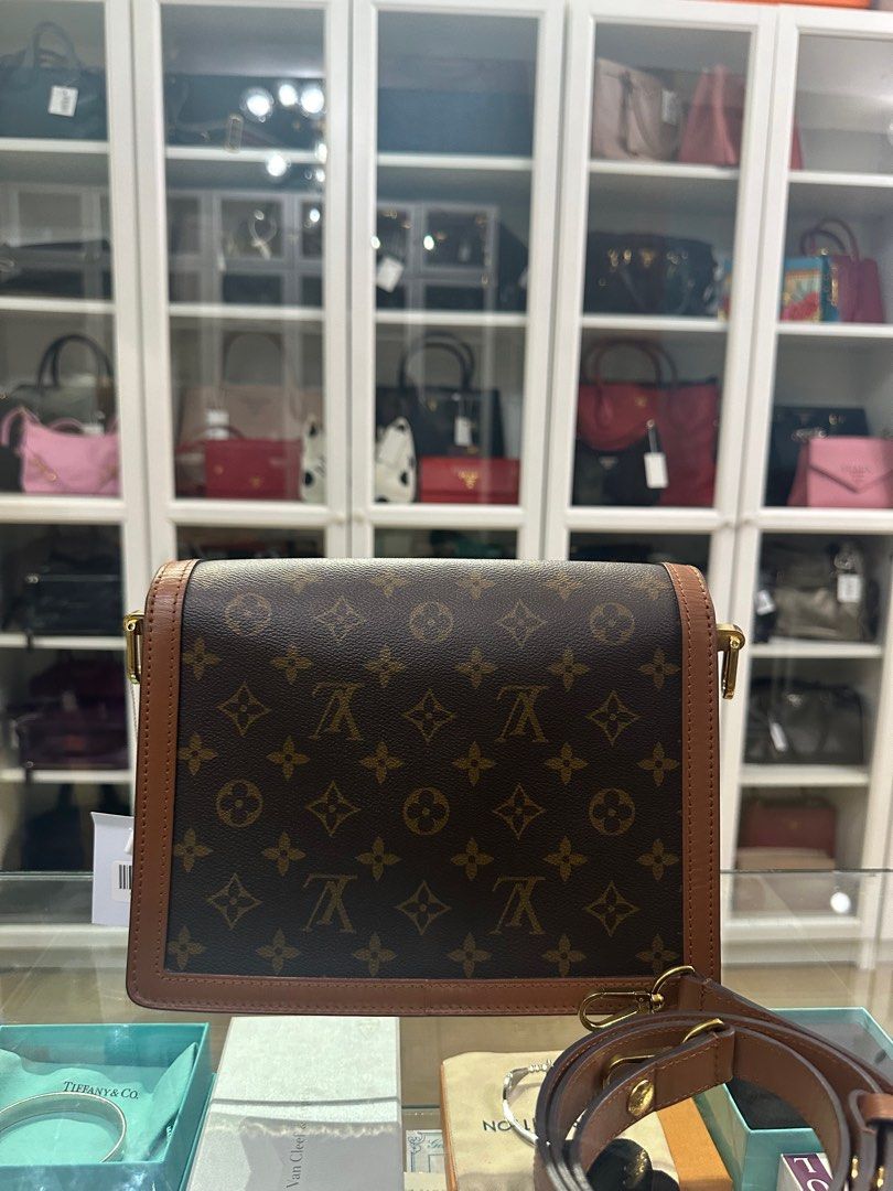Louis Vuitton Dauphine MM Bag in Reverse Monogram Canvas (Date code: CA0241) (Category: Luxury Bags & Wallets) located in Taguig. Submitted by closetcompany (Listing ID 1322268043, Image 3). Description: Louis Vuitton Dauphine MM Bag in Reverse Monogram Canvas (Date code: CA0241) 🫧Php 145,000 🫧CONDITION: Excellent condition with sign of usage. Hairline scratches on the hardware creasing on the sides, one small scuff on side, and small scratch m