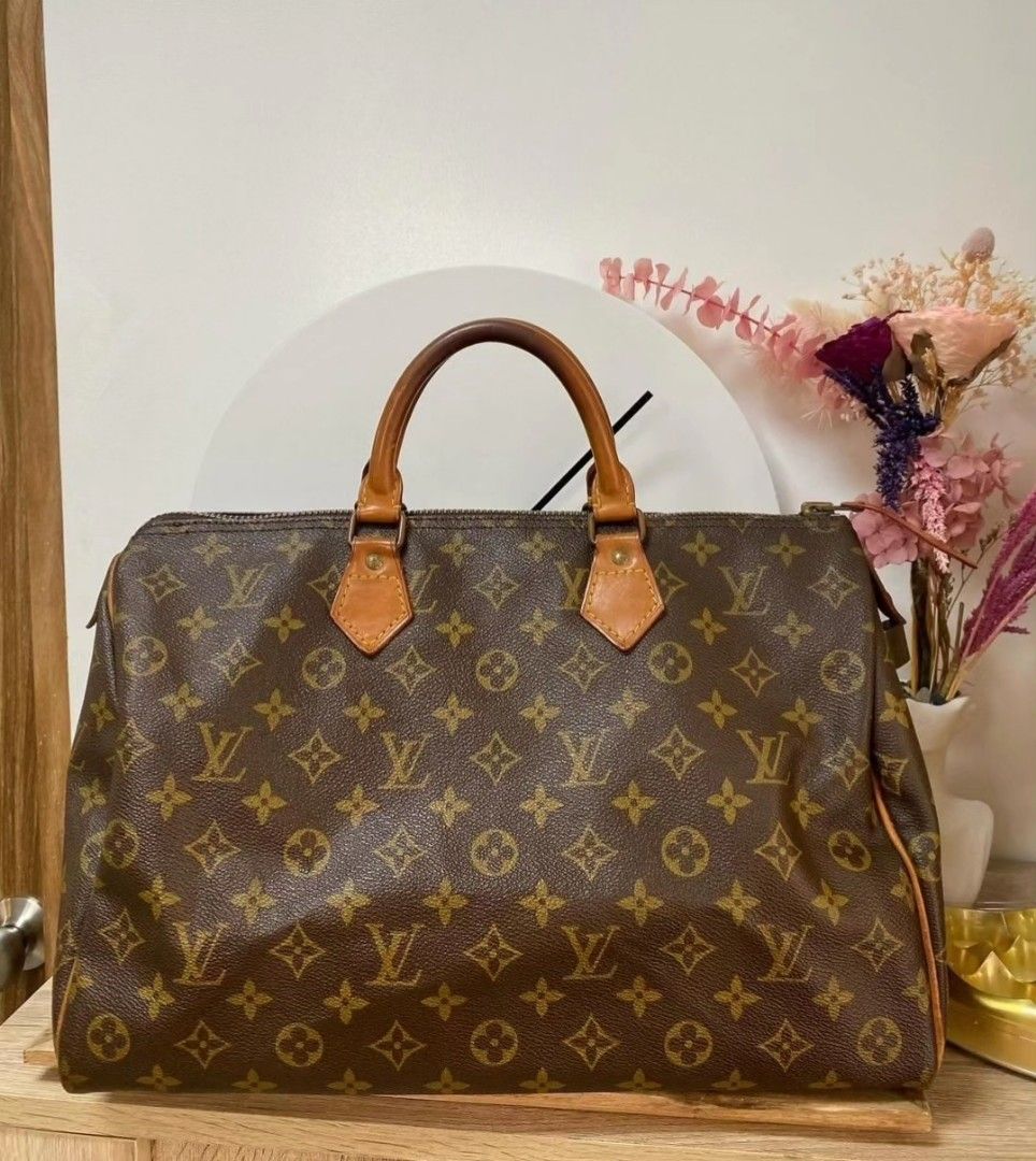LOUIS VUITTON Monogram Speedy 35 (Category: Luxury Bags & Wallets) located in Quezon City. Submitted by rmseller.2017 (Listing ID 1322219871, Image 1). Description: LOUIS VUITTON Monogram Speedy 35 | good condition | come with bag only | P23,500 only (open for installment).