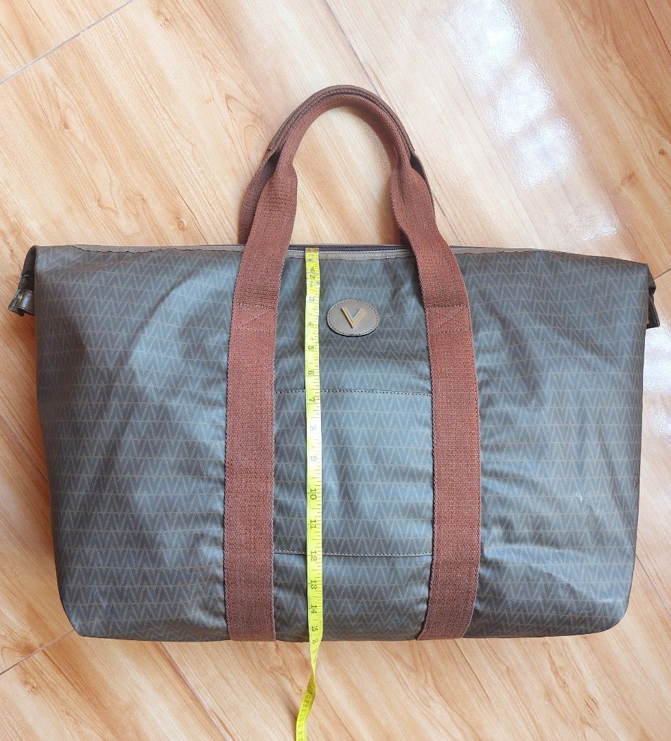 Mario Valentino travel bag (Category: Luxury Bags & Wallets) located in Davao. Submitted by wengbagstuff (Listing ID 1322266185, Image 3). Description: 🍀 vintage monogram pvc bag 🍀 light signs of usage 🍀 no bubbles, tear or holes 🍀 can be a travel bag or large tote bag.