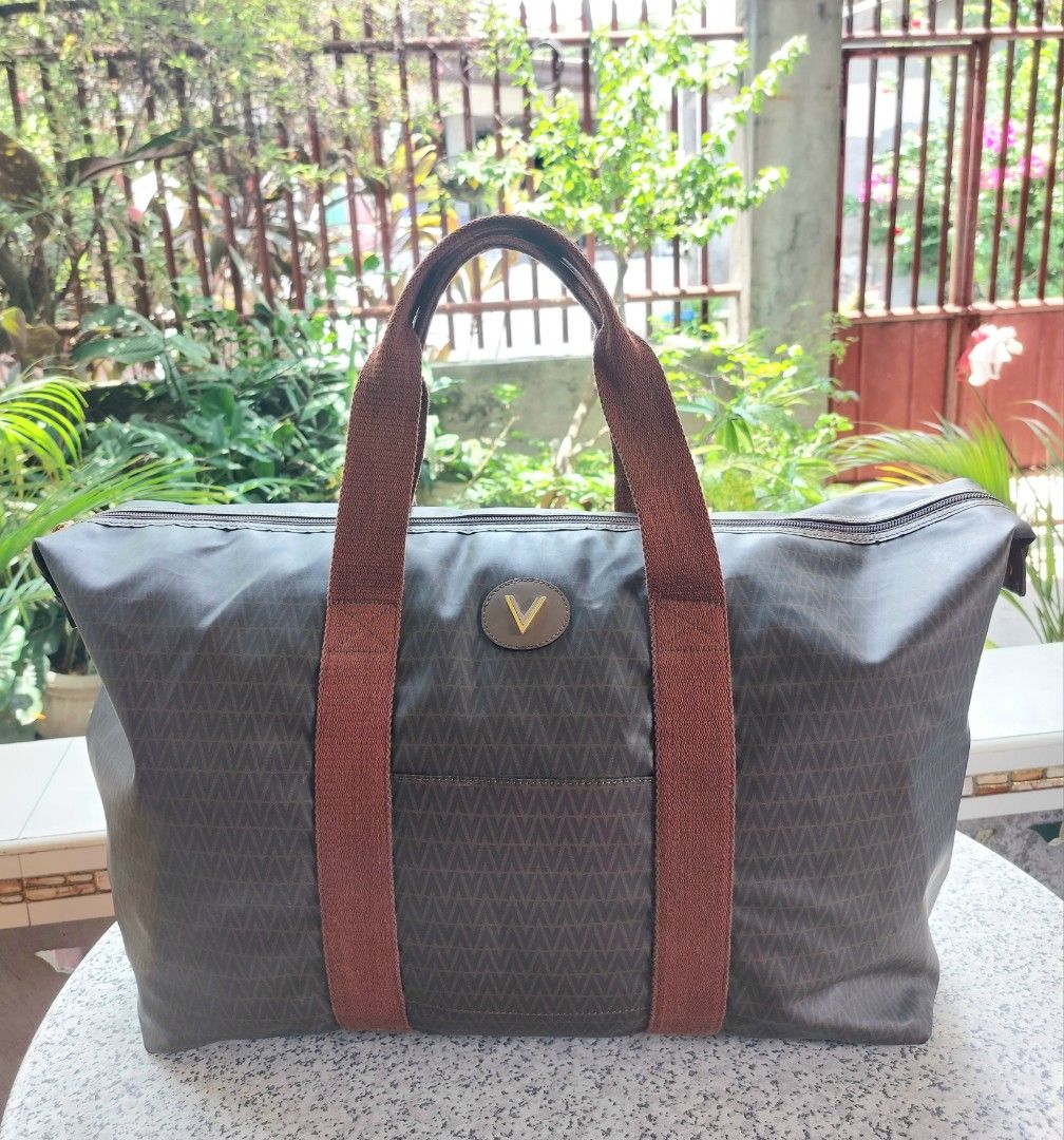 Mario Valentino travel bag (Category: Luxury Bags & Wallets) located in Davao. Submitted by wengbagstuff (Listing ID 1322266185, Image 2). Description: 🍀 vintage monogram pvc bag 🍀 light signs of usage 🍀 no bubbles, tear or holes 🍀 can be a travel bag or large tote bag.
