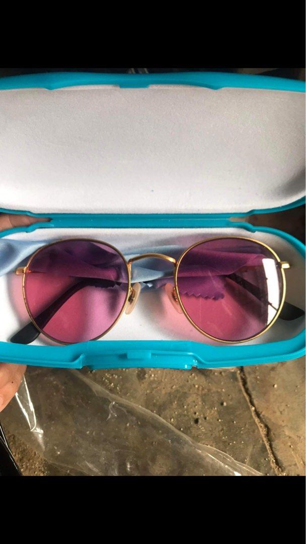 Original glasses (Category: Sunglasses & Eyewear) located in Surigao. Submitted by chip_munk (Listing ID 1322219015, Image 3). Description: Yellow peculiar brand- 250 Cat eye black blue pacific brand-399 3rd photo eye no right brand- 250 .