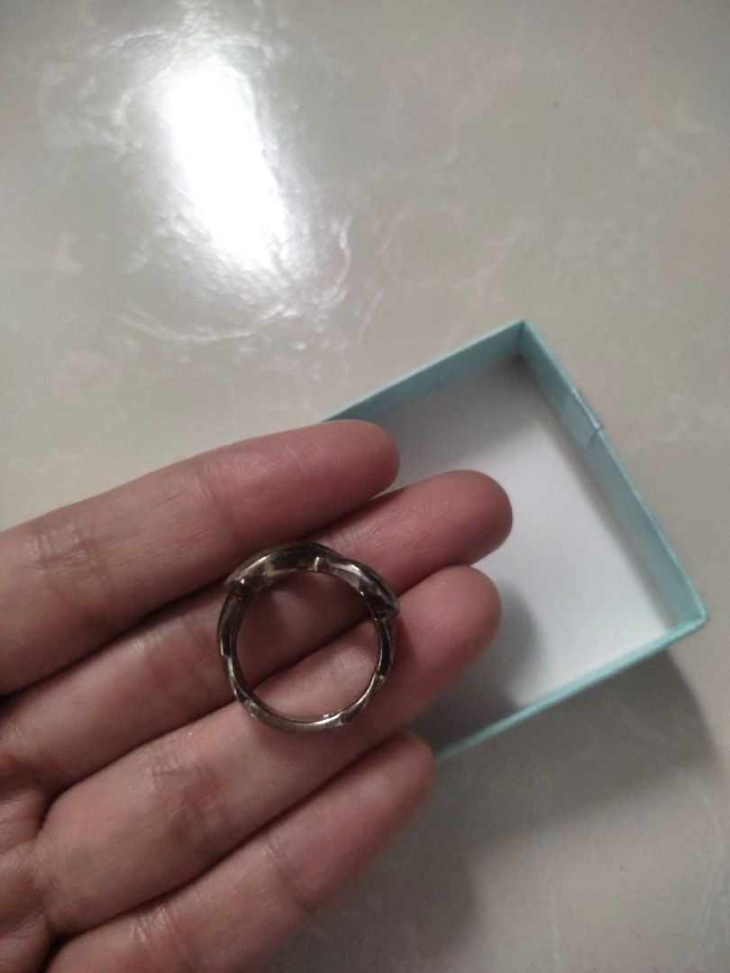 Original! Tiffany & Co. Infinity Silver Ring (Category: Rings) located in Las Pinas. Submitted by bibliomomma (Listing ID 1322237388, Image 3). Description: Guaranteed Authentic! Tiffany & Co. Infinity Ring Original receipt uploaded for your reference Excellent used condition, just needs cleaning Size 6 Money back guarantee if proven fake MOP Gcash.