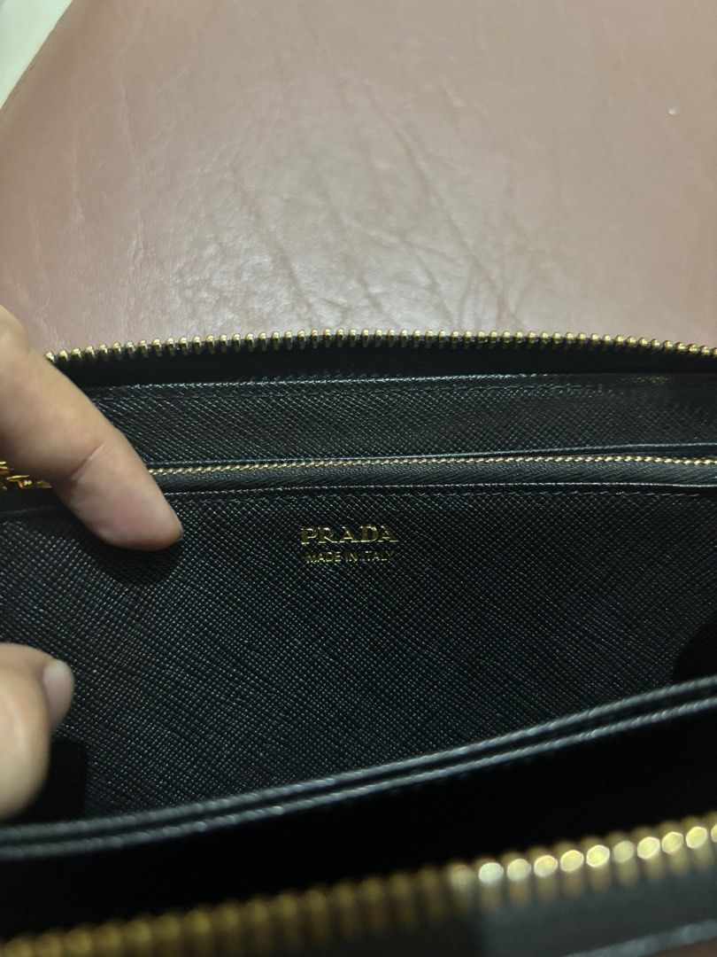 Prada Black Saffiano Leather Long Wallet (Category: Wallets & Card holders) located in Caloocan City. Submitted by thlyn (Listing ID 1322234669, Image 3). Description: Color & condition rate: 10/10 Preloved .