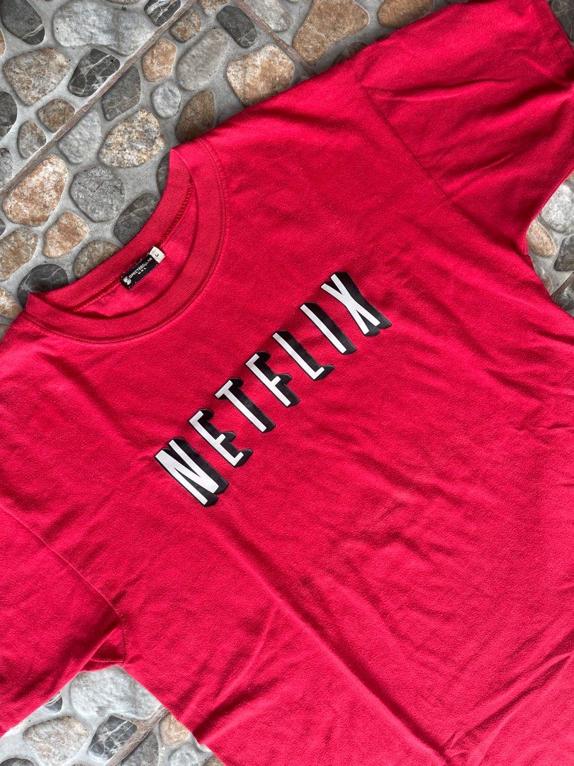 SPECTEECULAR MANILA NETFLIX TEE (Category: Tshirts & Polo Shirts ) located in Pasig City. Submitted by thriftzzsweep (Listing ID 1322301857, Image 2). Description: SPECTEECULAR MNL NETFLIX TEE ISSUE: NEED WASH COLOR RATE: 9 CONDITION: 8 SIZE ON TAG: L WIDTH: 20 LENGTH: 26 DETAILS: PRINTED TEE.