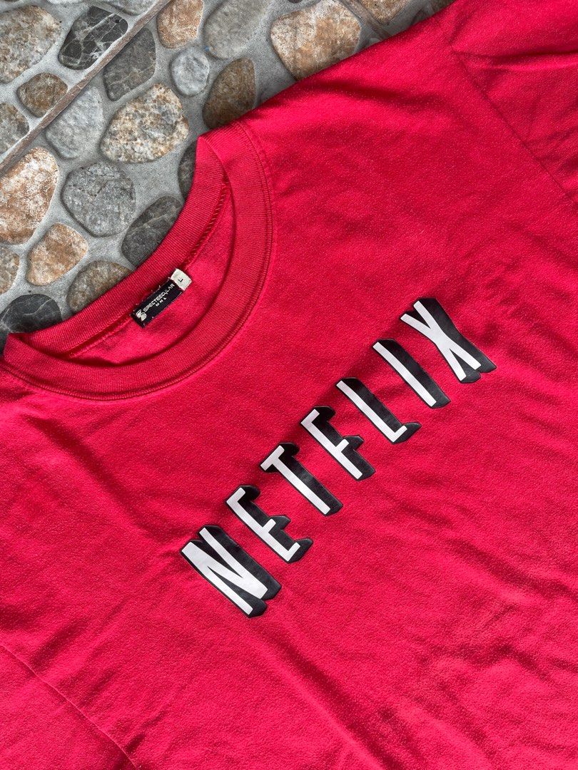 SPECTEECULAR MANILA NETFLIX TEE (Category: Tshirts & Polo Shirts ) located in Pasig City. Submitted by thriftzzsweep (Listing ID 1322301857, Image 3). Description: SPECTEECULAR MNL NETFLIX TEE ISSUE: NEED WASH COLOR RATE: 9 CONDITION: 8 SIZE ON TAG: L WIDTH: 20 LENGTH: 26 DETAILS: PRINTED TEE.