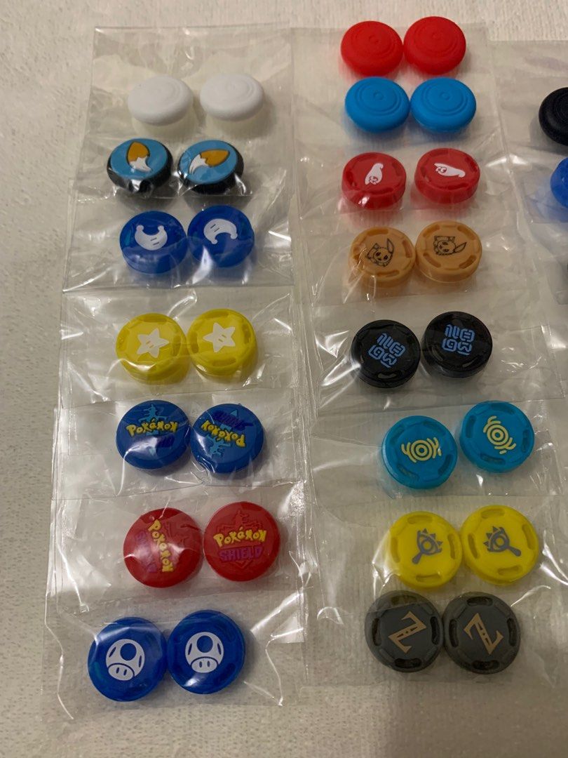 Switch thumb grip pair (Category: Nintendo) located in Quezon City. Submitted by juhaire (Listing ID 1322281419, Image 2). Description: Brand new all Availabale Switch thumb grip pairs 100 Hard pouch 350 Clear case 300 Temperd glass 300.