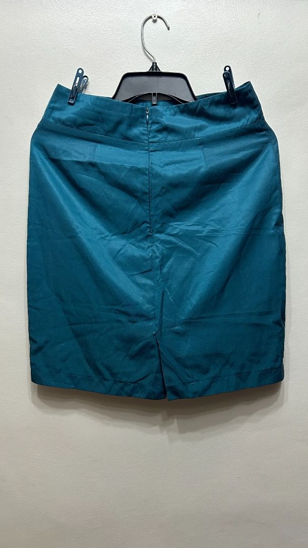 Teal Office Skirt (Small on tag) (Category: Skirts) located in Pasay City. Submitted by mgagamitnichrish (Listing ID 1322333848, Image 3). Description: Size: Best fit Small-Medium Condition: Pre-loved but still in great condition Length: 52cm Waist: 36in Hips: 42in.