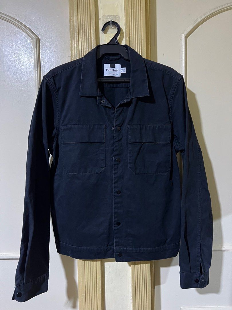 Topman jacket (Category: Coats, Jackets and Outerwear) located in Makati City. Submitted by basicprojects (Listing ID 1322298027, Image 1). Description: Worn only a couple of times and kept. Still in good condition and needs a new stylish owner. Black but looks more navy Shoulder 17in Width 20in Length 24.5in Sleeve length 23in.