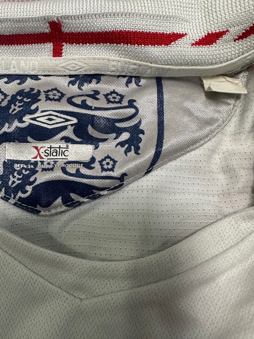 UMBRO | England 2006 Rooney Jersey (Category: Activewear) located in Lapu Lapu. Submitted by nervecloset (Listing ID 1322329897, Image 3). Description: UMBRO | England 2006 Rooney Jersey Large on tag W = 21.2 inches L = 27 inches Very good condition 2650 + sf.