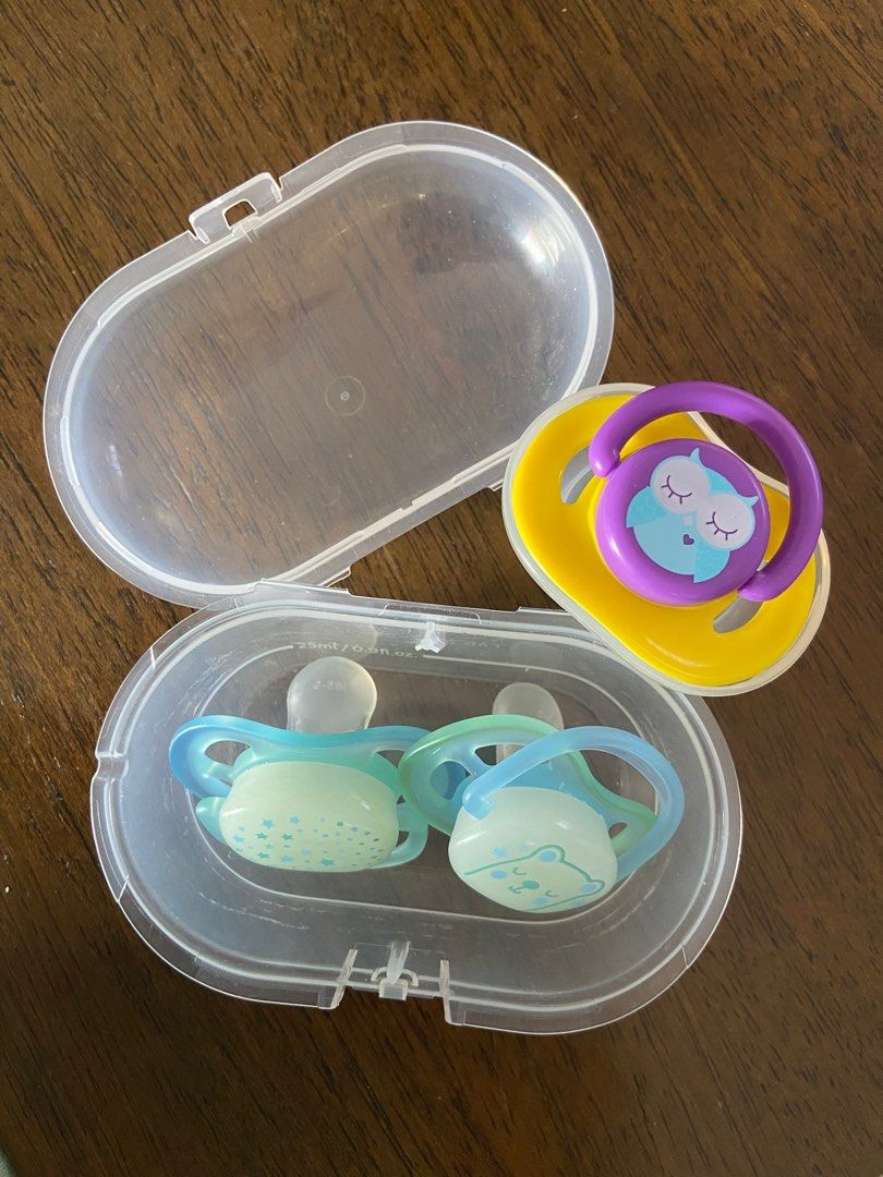 TAKE ALL USED Avent and Tiny Buds Night Pacifier (Category: Soothers & Pacifiers) located in Bulacan. Submitted by declutzy (Listing ID 1322233115, Image 1). Description: TAKE NOTE THAT THIS IS ALREADY USED ITEM 1 Original Avent Pacifiers Glow in the Dark with broken case (still working) 1 Tiny Buds Night Pacifier with Case This is used pacifiers Sign of water sterilization I tried to give my baby paci but he doesn’t like pacifiers BUY AT YOUR OW