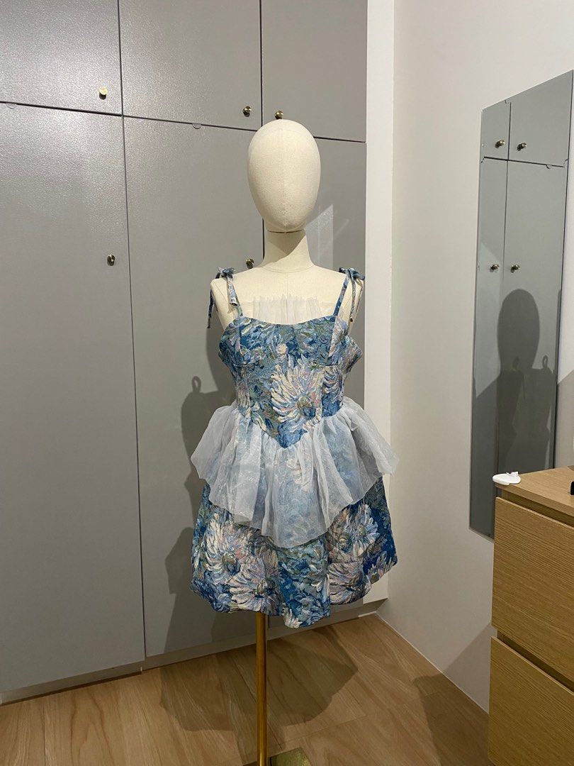 Blue Floral Dress (Category: Dresses) located in Cainta. Submitted by imsojelly (Listing ID 1322480057, Image 1). Description: Gorgeous floral blue dress. Thick fabric, fully lined inside, and straps are adjustable. Used once last year for a party. Fits L to XL..