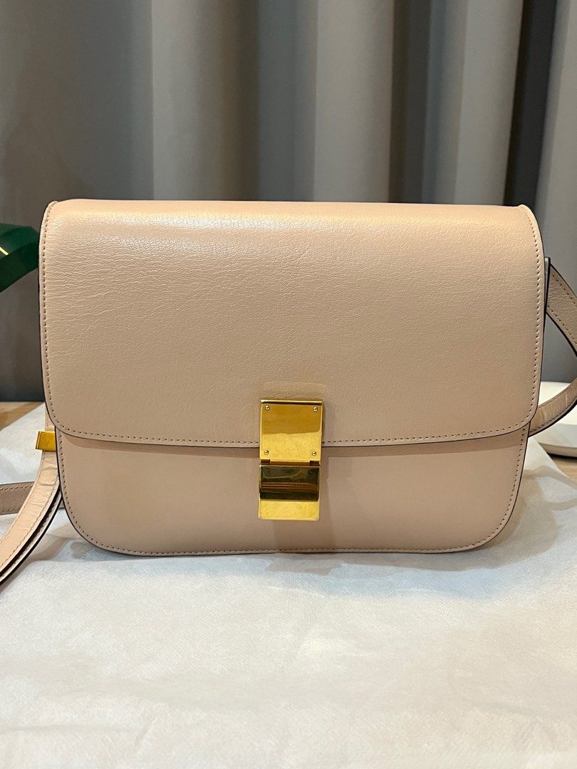 CELINE (Auth) Classic Box Shoulder Sling Bag, Medium, Nude (Category: Luxury Bags & Wallets) located in Pasig City. Submitted by theclosetcasemanila (Listing ID 1322534362, Image 2). Description: Guaranteed Authentic The must have classic Celine box bag in this chic neutral shade that matches everything!! No flaws. Super nice natural color. Leather is clean and has no major scratches Signs of light wear but no major issues. Excellent condition Ad