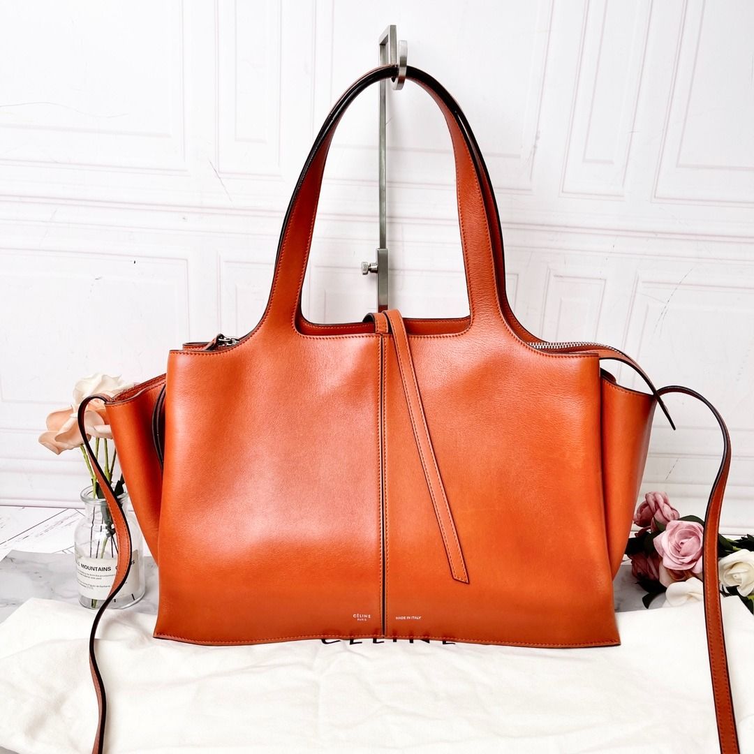 Celine Large Tri fold Bag in Orange Luxury Bags Wallets on Carousell