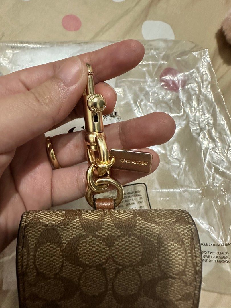 Coach Multiple Attachment Charm (Category: Luxury Bags & Wallets) located in Manila. Submitted by hapishopee (Listing ID 1322494097, Image 2). Description: Brand new Coach multiple attachment charm or can also be used as card case, coin purse or can also fit airpods.