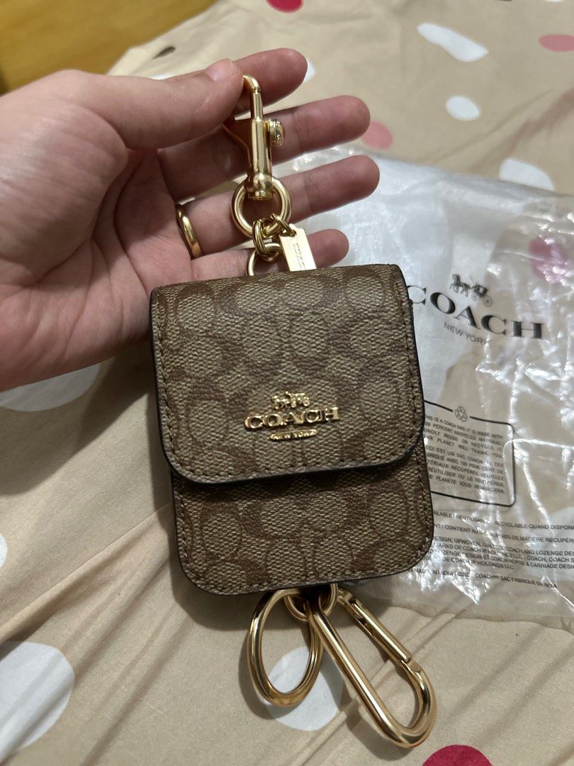 Coach Multiple Attachment Charm (Category: Luxury Bags & Wallets) located in Manila. Submitted by hapishopee (Listing ID 1322494097, Image 1). Description: Brand new Coach multiple attachment charm or can also be used as card case, coin purse or can also fit airpods.