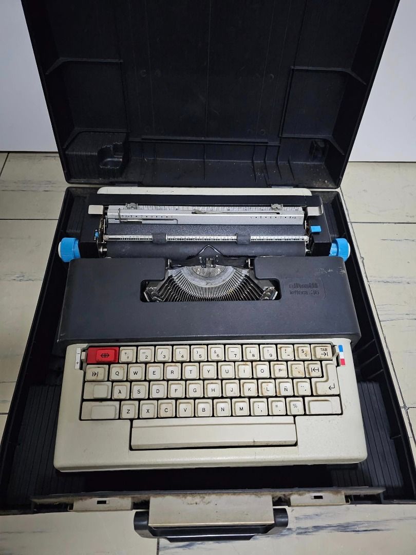 Olivetti Typewriter (needs repairs, for collectors) (Category: Office & Business Technology) located in Marikina City. Submitted by shoppobangpo (Listing ID 1322418449, Image 2). Description: Vintage Olivetti Lettera 36 typewriter. Comes with case. Looks great. Update on condition: needs repairs to make it work again. RFS: Learning to let go of some sentimental items..
