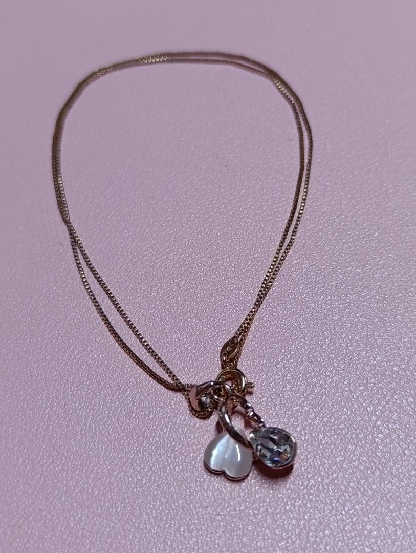 ROSE GOLD PLATED HEART DESIGN KLAD (Category: Necklaces) located in Quezon City. Submitted by cleoshoppe (Listing ID 1322420099, Image 3). Description: •Used only once •Bought at SM Department Store •Originally priced at 1,500 and sale for 950 pesos. •With box only.