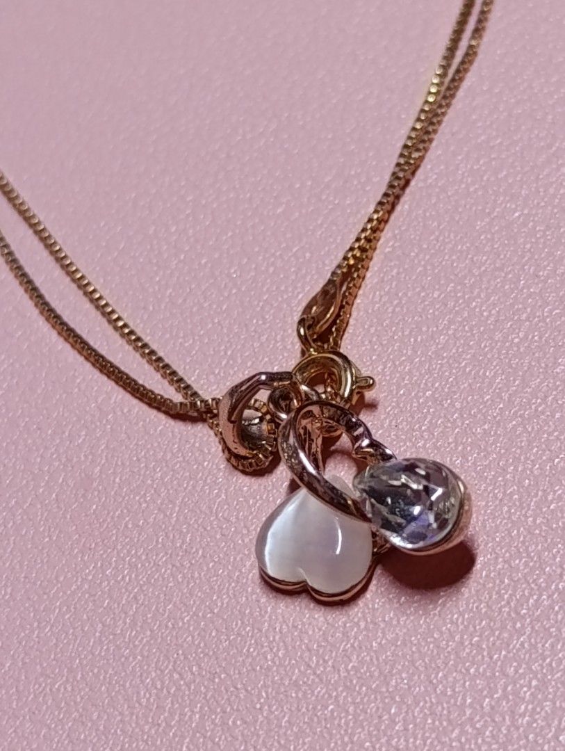 ROSE GOLD PLATED HEART DESIGN KLAD (Category: Necklaces) located in Quezon City. Submitted by cleoshoppe (Listing ID 1322420099, Image 2). Description: •Used only once •Bought at SM Department Store •Originally priced at 1,500 and sale for 950 pesos. •With box only.