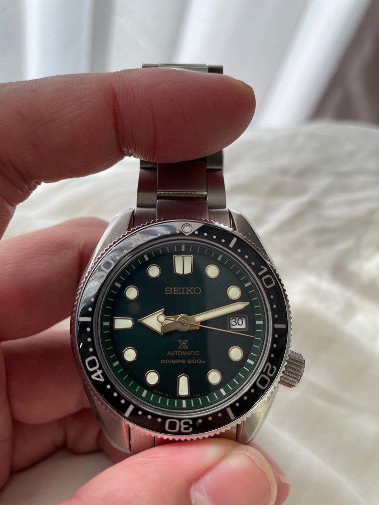 Seiko SPB105j green dial gold trim hands perfect combination of
