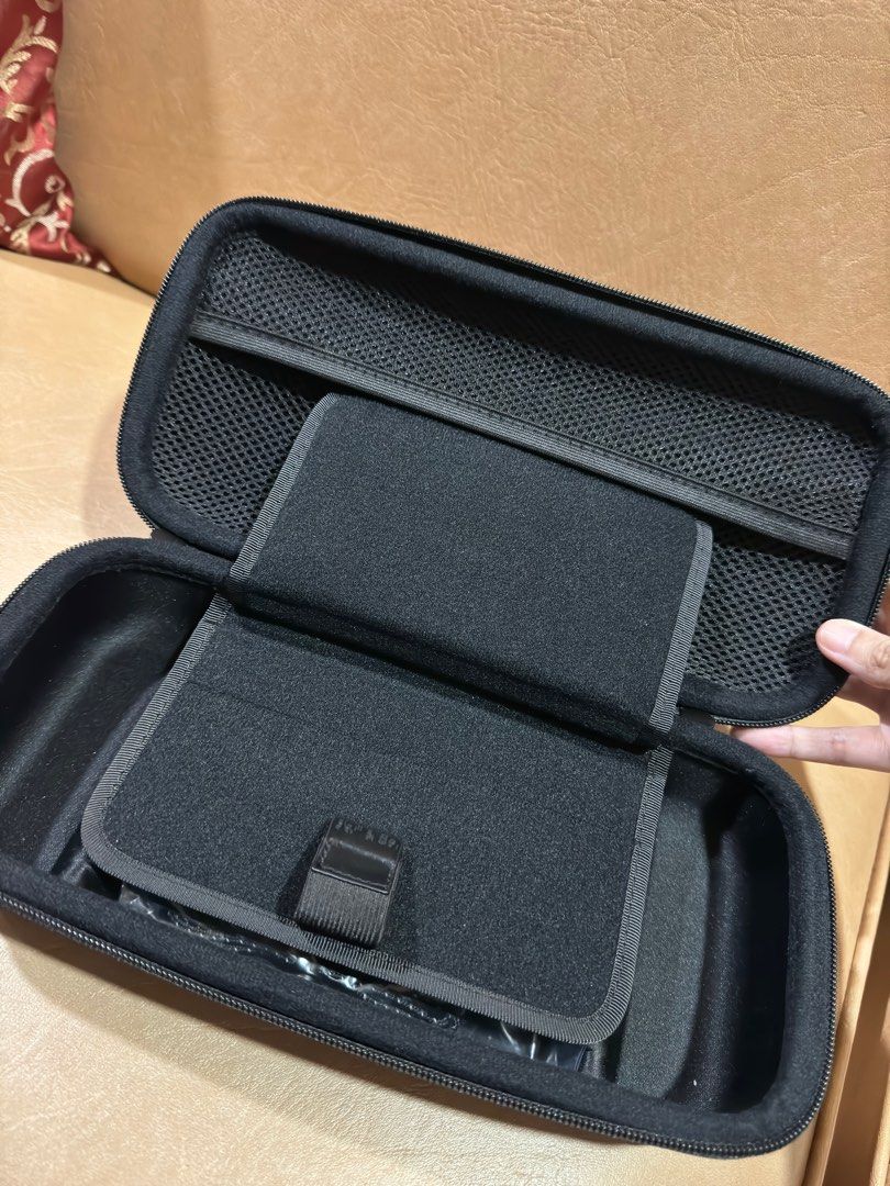 Skull & Co Nintendo Switch Case with Free Grip (Category: Cases & Covers) located in Manila. Submitted by vintageluxefinder (Listing ID 1322507904, Image 3). Description: Nintendo Switch Case with Game compartments and free skull and co grip as well Rfs: wala na ako switch haha.