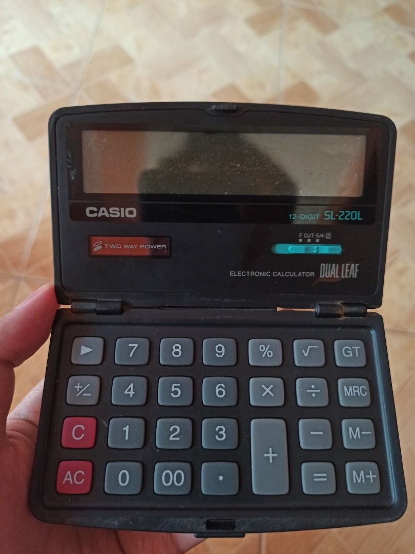 Casio SL-220L Solar-powered Calculator (Category: Electrical, Adaptors & Sockets) located in Las Pinas. Submitted by kenespera123 (Listing ID 1322593185, Image 2). Description: Casio SL-220L Solar-powered Calculator 12-digit LCD calculator. Does not work when there is no sunlight. The LCD is already faded Price: 300 pesos Meetup or delivery. Contact me for further inquiries. Thank you! :).