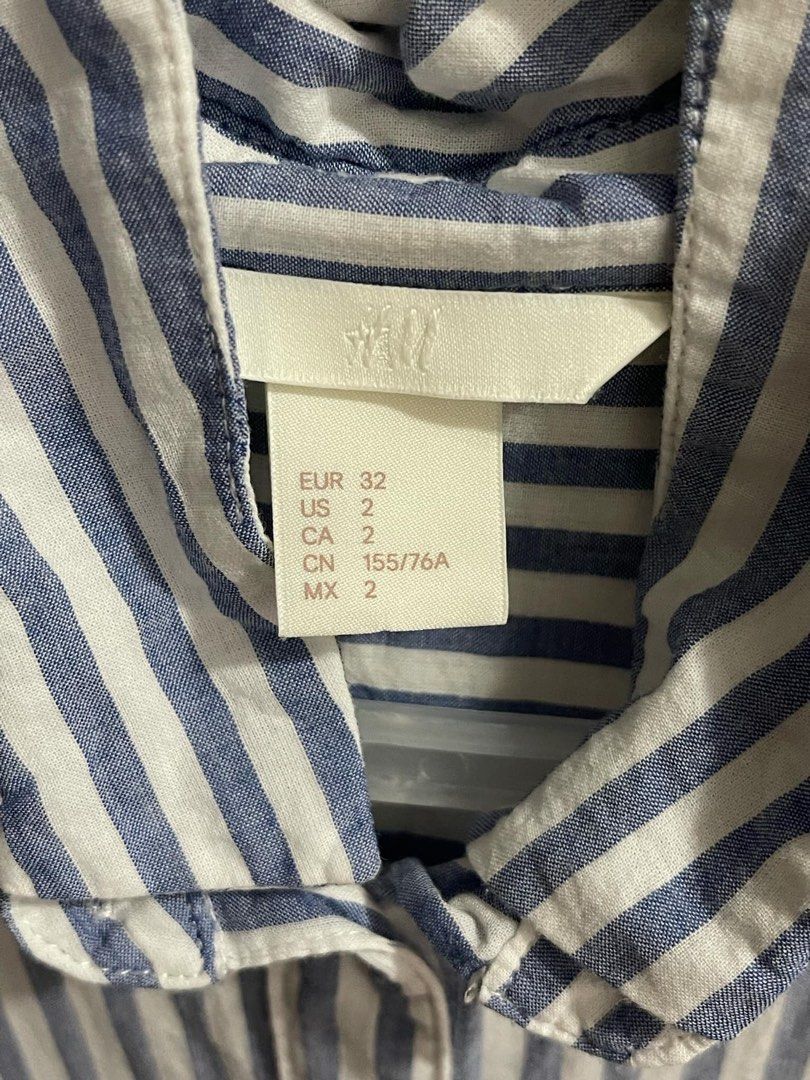 H&M Blue and White Striped Button Down (XXS) (Category: Longsleeves) located in Rizal. Submitted by marga911 (Listing ID 1322639490, Image 2). Description: H&M Blue and White Striped Button Down (XXS) Courier Or Meet-up (SM Taytay, SM Megamall or Robinsons Galleria).