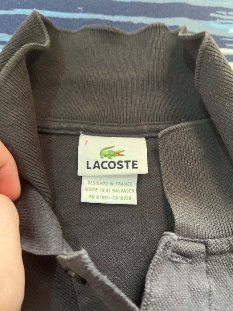 Lacoste Black Polo Shirt (Category: Tshirts & Polo Shirts ) located in Manila. Submitted by timofefe (Listing ID 1322627617, Image 2). Description: Lacoste Black Polo Shirt Well Used Collar slightly faded Fits M-L Price is negotiable Loc: QC.