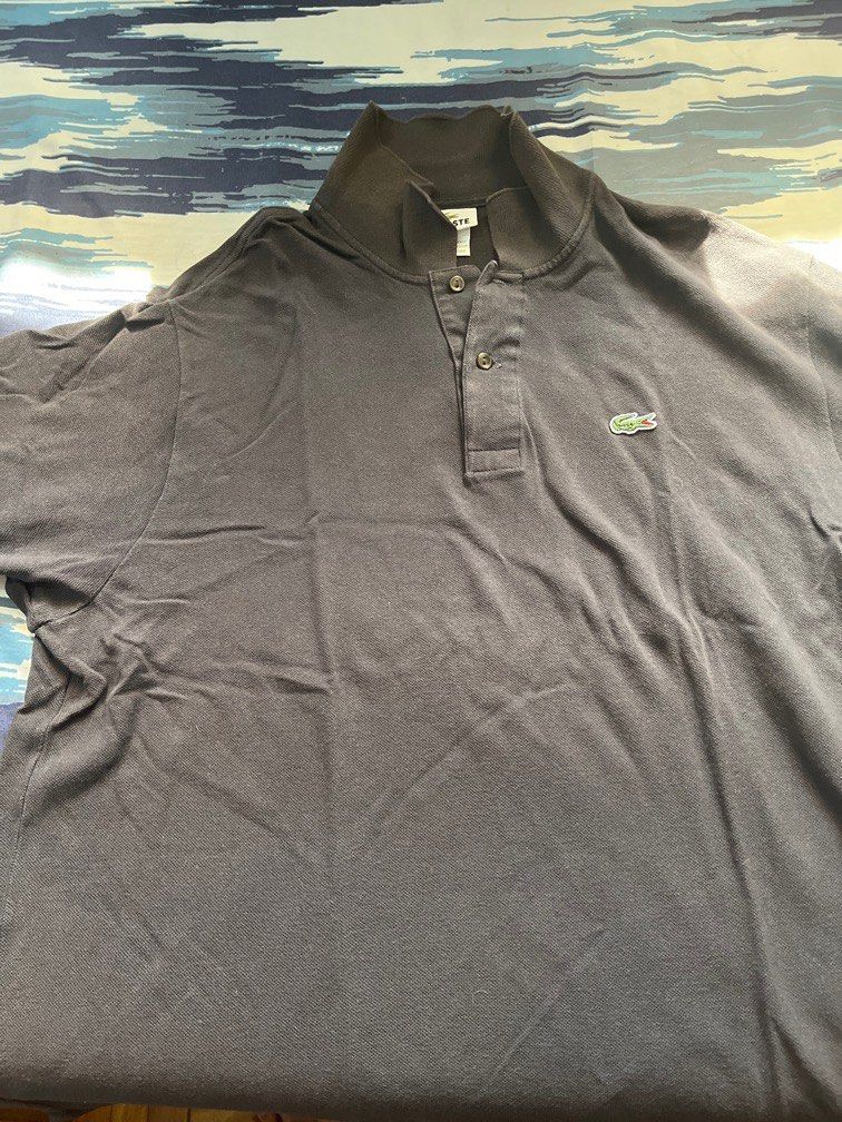 Lacoste Black Polo Shirt (Category: Tshirts & Polo Shirts ) located in Manila. Submitted by timofefe (Listing ID 1322627617, Image 1). Description: Lacoste Black Polo Shirt Well Used Collar slightly faded Fits M-L Price is negotiable Loc: QC.