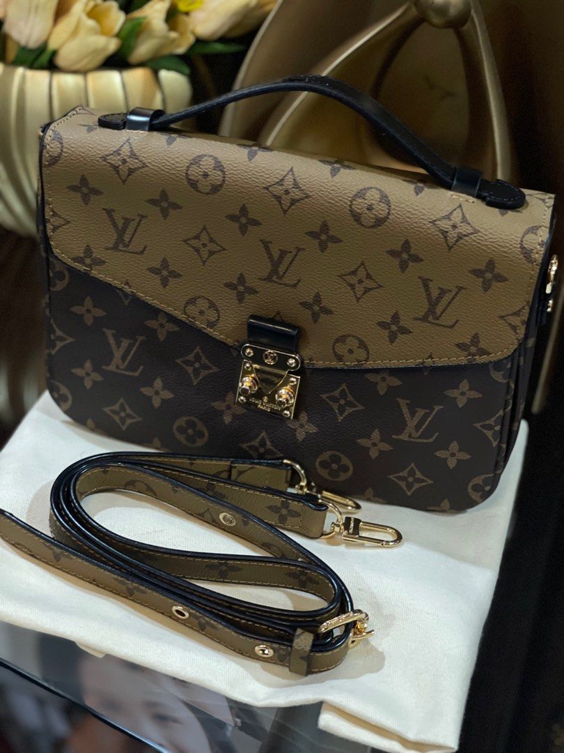 [REPRICED] Louis Vitton Pochette Metis Reverse Monogram (Category: Luxury Bags & Wallets) located in Bocaue. Submitted by diana_ram1306 (Listing ID 1322689763, Image 2). Description: SELLING LOW! Louis Vitton Pochette Metis Reverse Monogram Details: Coded. Logo engraved. No hairlines sa hardwares. No rubs sa leather. Malinis inside & out. Bought from Japan high quality thrift shop. Inclusions: LV dust bag & like-new strap. NGA. For inquiries, msg