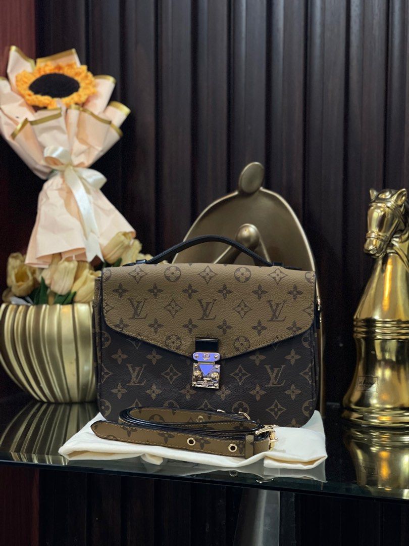 [REPRICED] Louis Vitton Pochette Metis Reverse Monogram (Category: Luxury Bags & Wallets) located in Bocaue. Submitted by diana_ram1306 (Listing ID 1322689763, Image 1). Description: SELLING LOW! Louis Vitton Pochette Metis Reverse Monogram Details: Coded. Logo engraved. No hairlines sa hardwares. No rubs sa leather. Malinis inside & out. Bought from Japan high quality thrift shop. Inclusions: LV dust bag & like-new strap. NGA. For inquiries, msg