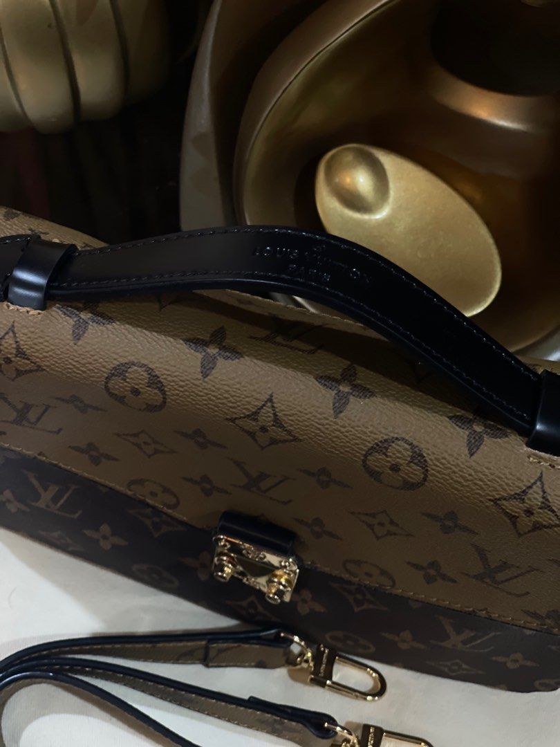 [REPRICED] Louis Vitton Pochette Metis Reverse Monogram (Category: Luxury Bags & Wallets) located in Bocaue. Submitted by diana_ram1306 (Listing ID 1322689763, Image 3). Description: SELLING LOW! Louis Vitton Pochette Metis Reverse Monogram Details: Coded. Logo engraved. No hairlines sa hardwares. No rubs sa leather. Malinis inside & out. Bought from Japan high quality thrift shop. Inclusions: LV dust bag & like-new strap. NGA. For inquiries, msg
