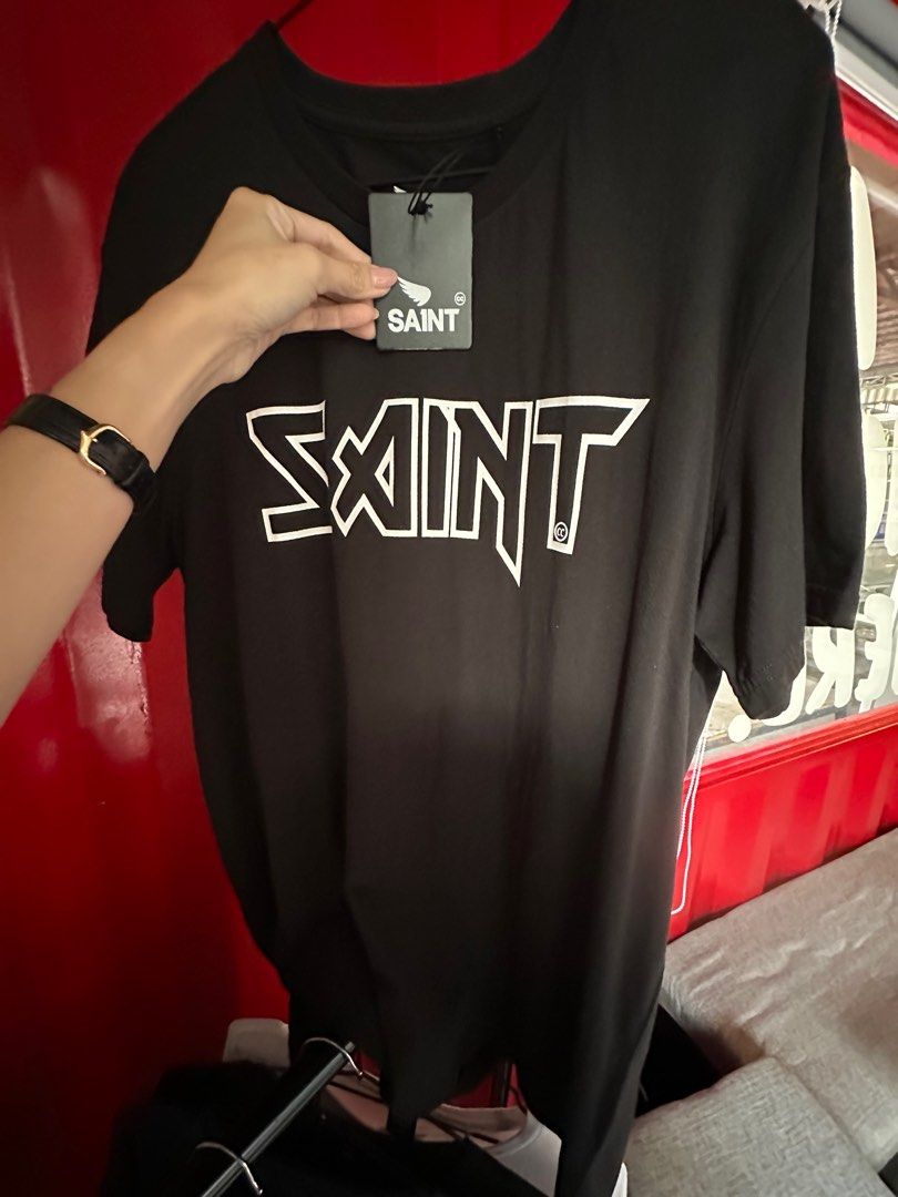 SA1NT Merch (Category: Tshirts & Polo Shirts ) located in Paranaque City. Submitted by listitwithb (Listing ID 1322587379, Image 2). Description: SA1NT MERCH Selling as set only. All brand new and with tags. What you will get: 6pcs Saint Shirts - 4 Large - 2 XL 2pcs XL longsleeves 2pcs Balaclava SRP: ₱1999-₱2599 each ‼️selling as bulk way below cost: ₱6000 only .