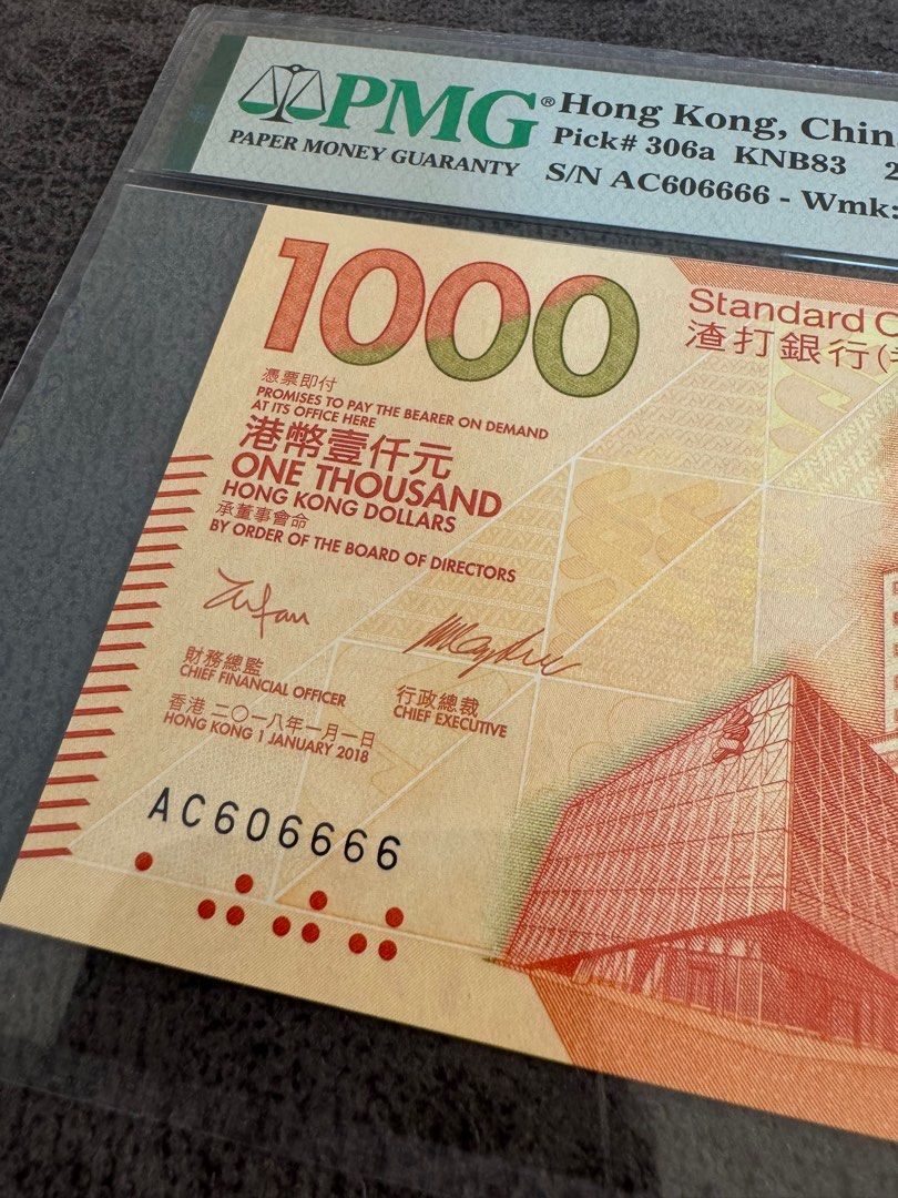 龍年錢幣清貨優惠🐲🧧) 【罕品！PMG 69 亞軍分！隔沙號全圓底🤩】2018年渣打$1000 兩字鈔靚號。PMG 69  只有28張，十分稀少，對上冠軍分只有8張，靚號難求，隔沙號、倒置號、全圓底兼具，值得收藏！【號碼：AC606666】, 興趣及遊戲, 收藏品及紀念品,  錢幣- Carousell