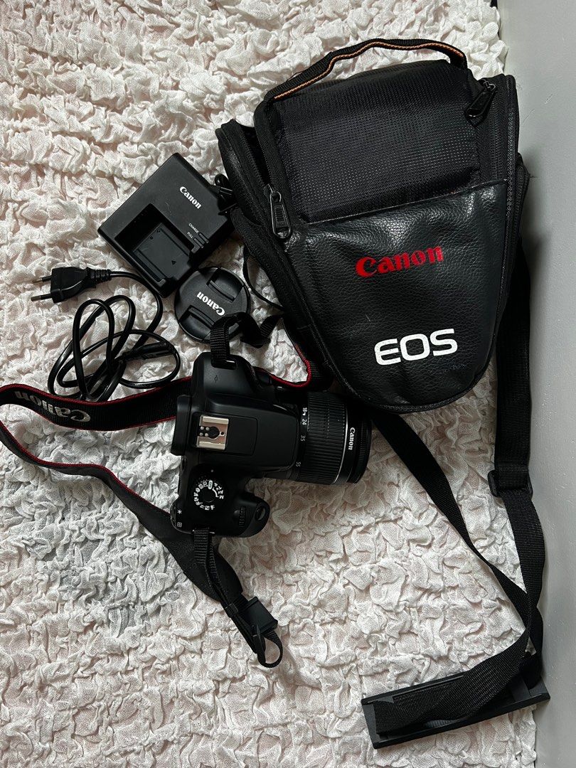 CANON EOS 3000D (Category: Cameras) located in Taguig. Submitted by aizonlineshopph (Listing ID 1317930585, Image 3). Description: For Sale Canon Eos Rebel T100 EOS 3000D Inclusions (comes with box) - Camera (with eye cap and body cap) - Strap - Lens (18-55mm) - Battery Pack LP-E10 (with protective cover) - Battery Charger LC-E10 - Power cord for battery charger Price: Php 23,000.00 Bought 2 years ago In a very good condition 3x lang nagamit RFS: