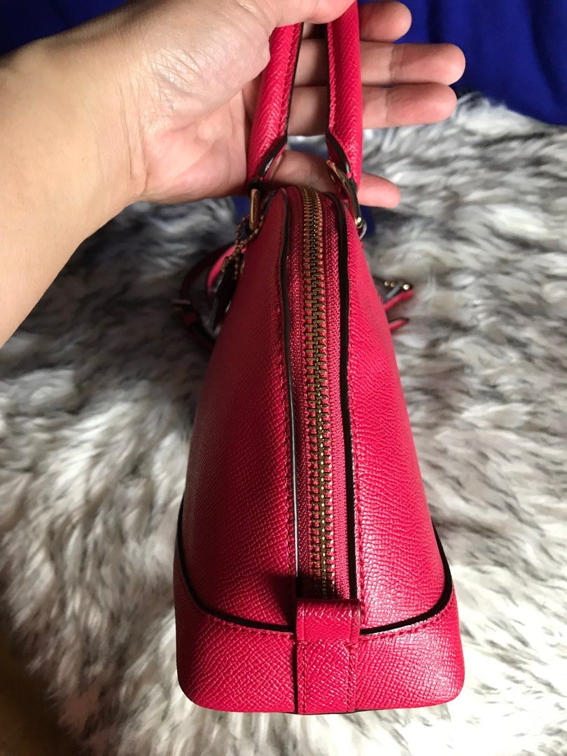 Coach Semi small alma bag (Category: Luxury Bags & Wallets) located in Santa Rosa. Submitted by rina.rina3 (Listing ID 1317902184, Image 3). Description: Preowned Coach Alma mini bag from Korea Lightweight but sturdy Hardwares are very gold Adjustable strap With flaws sa creed (see last photo) hence selling low Bag dimensions all in inches, LXWXH 10.5in x 4in x 7in Bag height including top handle is 14in approx. Slightly negotiable Buyer to shoul