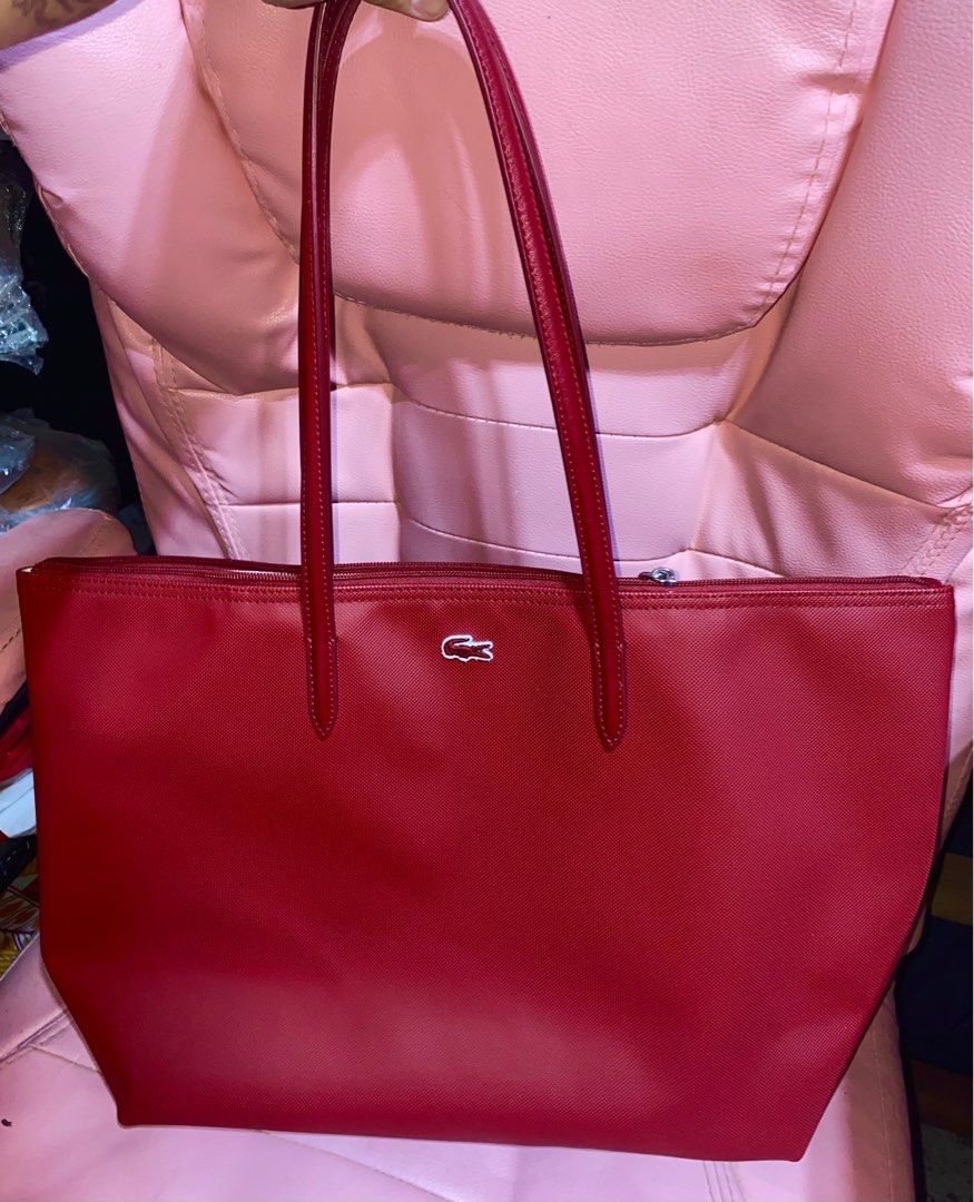 Lacoste Tote Bag. Authentic. 2,500 (Category: Luxury Bags & Wallets) located in Pasay City. Submitted by madelinefashionshop (Listing ID 1317906376, Image 1). Description: Bought from US Pasabuy Loc: Pasay Good condition / Good as new Rfs: Need funds Pm for interested buyer only.