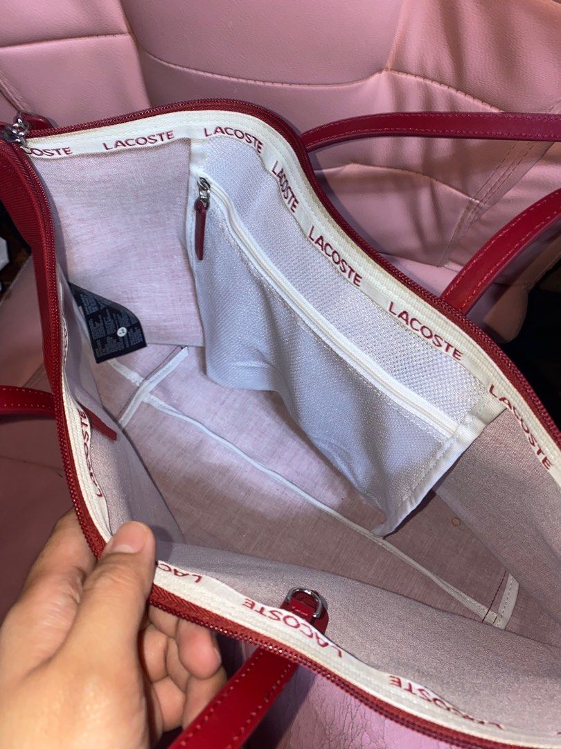 Lacoste Tote Bag. Authentic. 2,500 (Category: Luxury Bags & Wallets) located in Pasay City. Submitted by madelinefashionshop (Listing ID 1317906376, Image 3). Description: Bought from US Pasabuy Loc: Pasay Good condition / Good as new Rfs: Need funds Pm for interested buyer only.