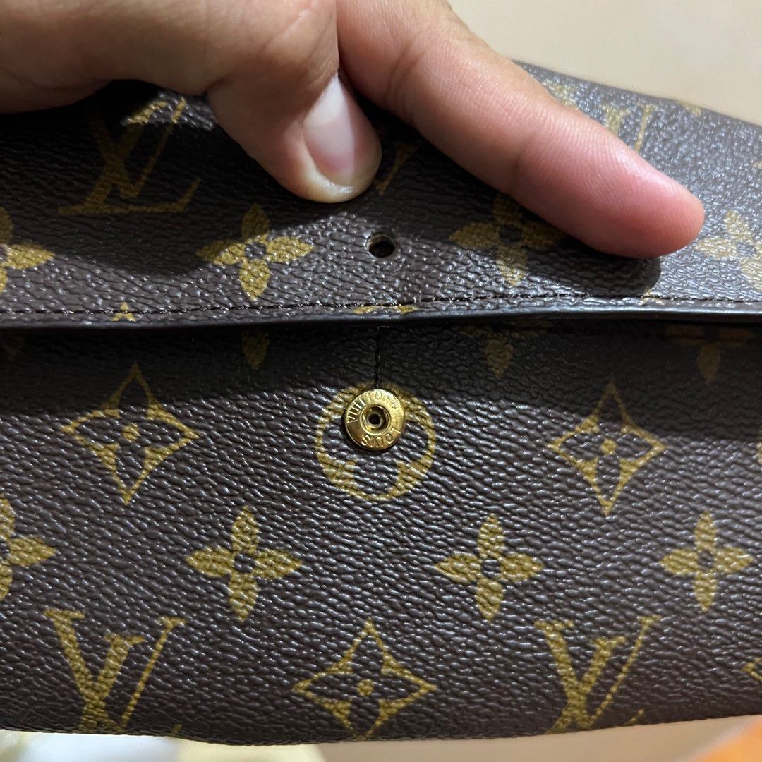 Louis Vuitton Monogram Wallet (Category: Luxury Bags & Wallets) located in Bauang. Submitted by ivaniboy (Listing ID 1317961442, Image 3). Description: LV wallet in good condition signs of usage missing lock button 599 only.