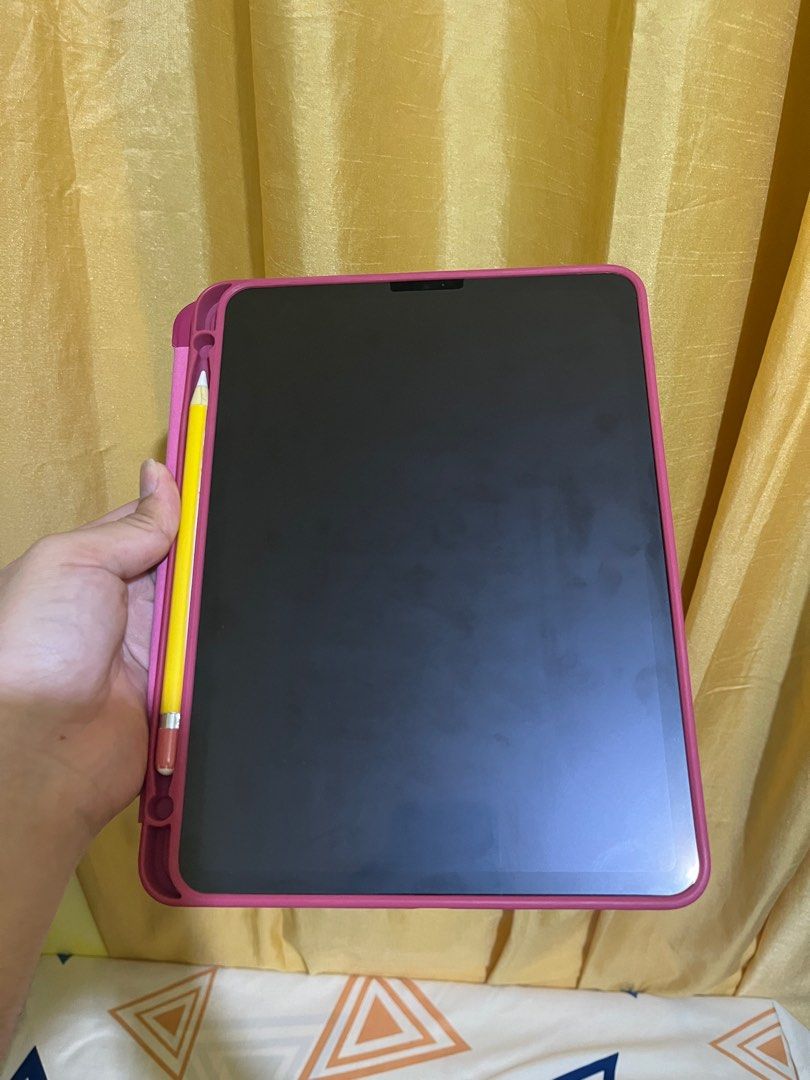 Pink Trifold case for iPad Pro (2018-2020) (Category: Cases & Sleeves) located in Quezon City. Submitted by aimahoe (Listing ID 1317989597, Image 2). Description: Can fit M1-M2 but speaker grilles aren’t aligned.