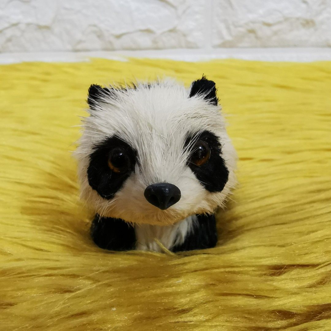 Real fur panda bear figurine (Category: Figurines & Statues) located in Kawit. Submitted by thrift_nook (Listing ID 1317891331, Image 2). Description: one eye has small scratches, as seen on last pic.
