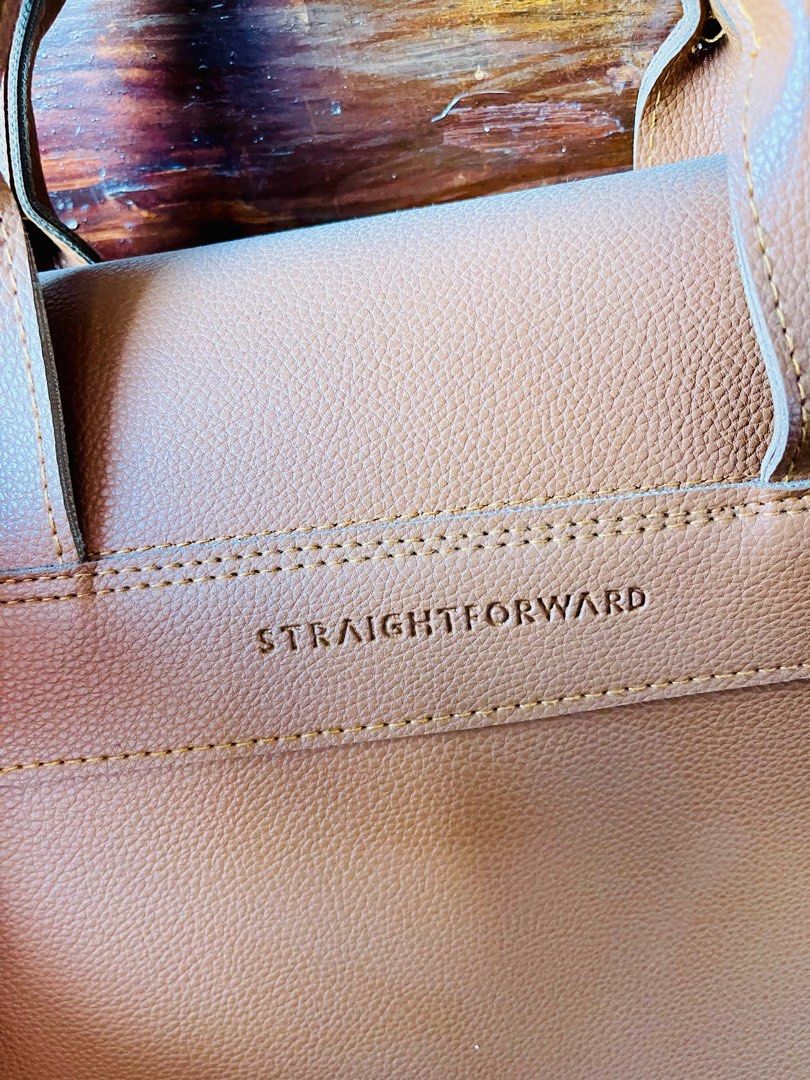 StraightForward Leather Backpack (Category: Backpacks) located in Manila. Submitted by hj_256734 (Listing ID 1317930144, Image 2). Description: Business Bag. Super classy. can fit 12 linch Laptop. Issue: Strap Area, pls see photo..