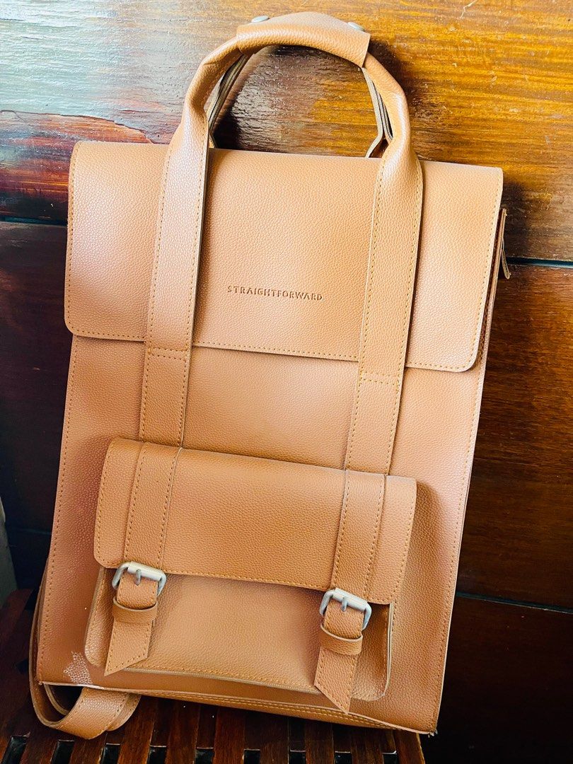 StraightForward Leather Backpack (Category: Backpacks) located in Manila. Submitted by hj_256734 (Listing ID 1317930144, Image 1). Description: Business Bag. Super classy. can fit 12 linch Laptop. Issue: Strap Area, pls see photo..