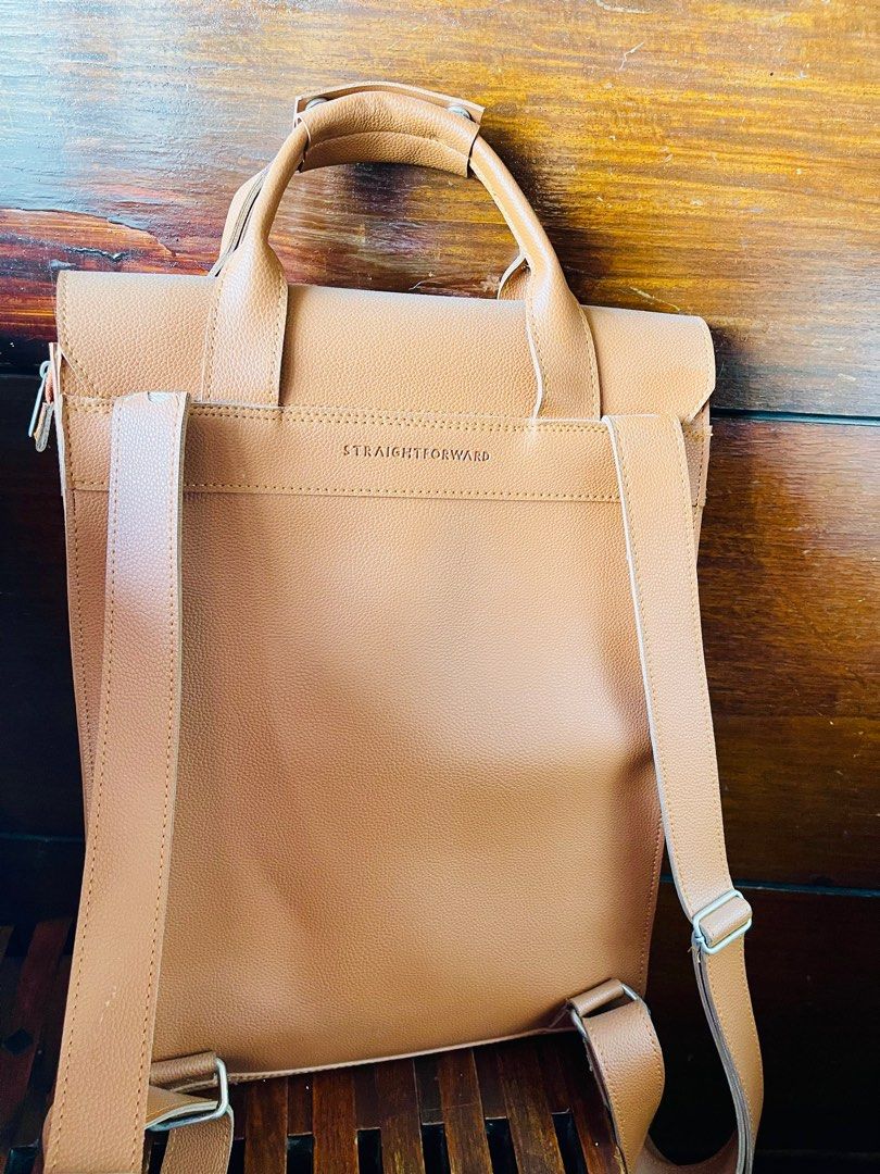 StraightForward Leather Backpack (Category: Backpacks) located in Manila. Submitted by hj_256734 (Listing ID 1317930144, Image 3). Description: Business Bag. Super classy. can fit 12 linch Laptop. Issue: Strap Area, pls see photo..