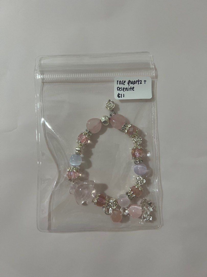 Assorted Crystal Bracelets (Category: Bracelets) located in Singapore. Submitted by mykacx (Listing ID 1322874530, Image 5). Description: various crystal bracelets! price + crystal is on the bag :) more in the other listings! - slide 1: amethyst - slide 2: alashan - slide 3: blue chalcedony - slide 4: lepidolite - slide 5: rose quartz + selenite - slide 6: flower agate - slide 7: rose quartz - slide 8: sakura rhodonite + labradorite - slide 9: ro