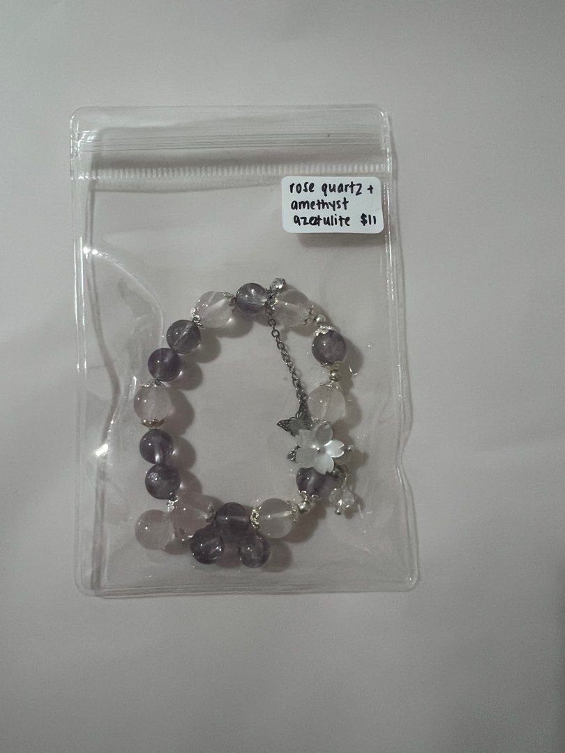 Assorted Crystal Bracelets (Category: Bracelets) located in Singapore. Submitted by mykacx (Listing ID 1322874530, Image 9). Description: various crystal bracelets! price + crystal is on the bag :) more in the other listings! - slide 1: amethyst - slide 2: alashan - slide 3: blue chalcedony - slide 4: lepidolite - slide 5: rose quartz + selenite - slide 6: flower agate - slide 7: rose quartz - slide 8: sakura rhodonite + labradorite - slide 9: ro