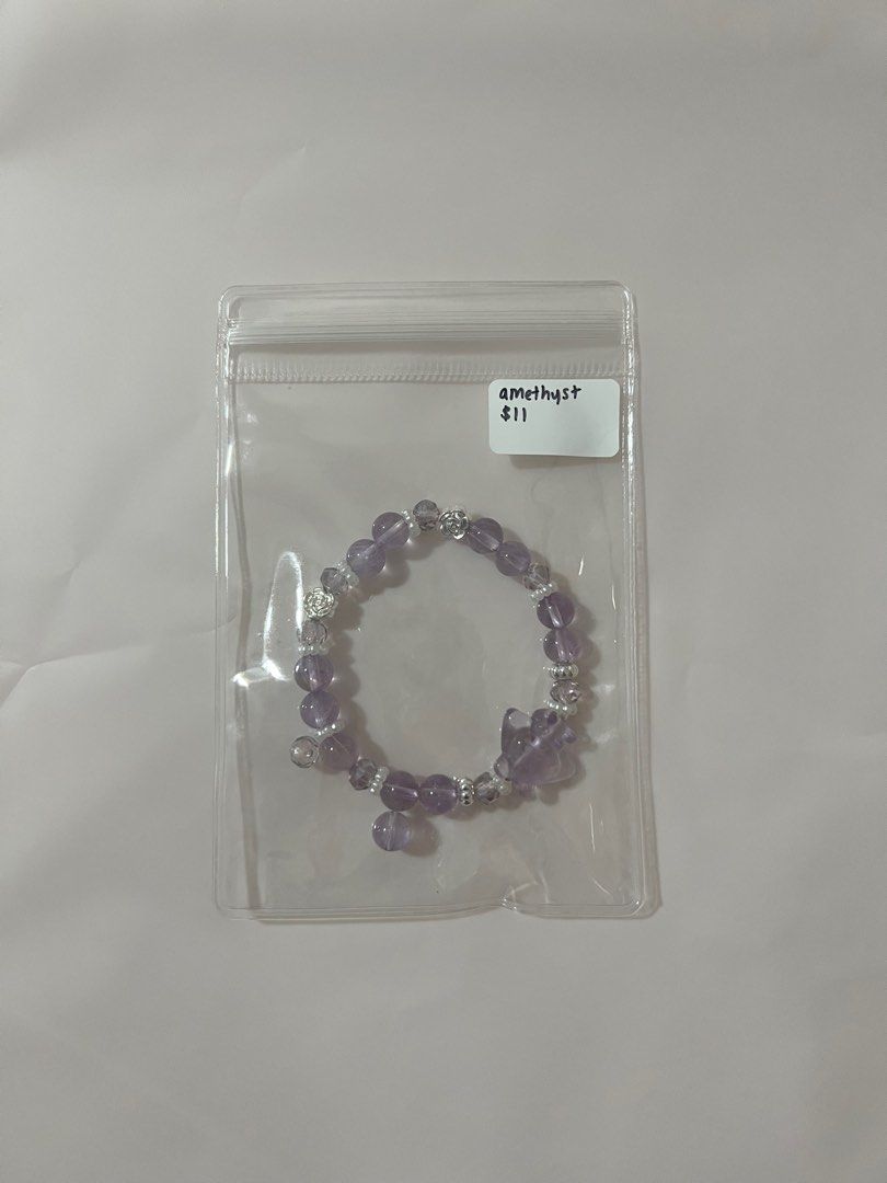 Assorted Crystal Bracelets (Category: Bracelets) located in Singapore. Submitted by mykacx (Listing ID 1322874530, Image 1). Description: various crystal bracelets! price + crystal is on the bag :) more in the other listings! - slide 1: amethyst - slide 2: alashan - slide 3: blue chalcedony - slide 4: lepidolite - slide 5: rose quartz + selenite - slide 6: flower agate - slide 7: rose quartz - slide 8: sakura rhodonite + labradorite - slide 9: ro