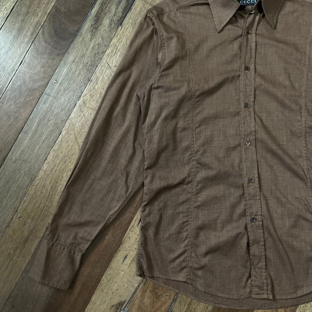 Gucci Brown Button Up Shirt (Authentic) (Category: Luxury Apparel) located in Quezon. Submitted by 0174.archive (Listing ID 1322836049, Image 2). Description: very good used condition no flaws faded washtag size 41/16 on tag Actual Measurements (inches) Chest (pit to pit): 21.5 Length: 28.5 Shoulder:19 Sleeve: 26.5.