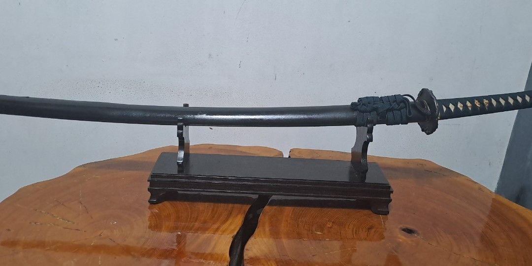 Katana Display sword (Category: Vintage Collectibles) located in Quezon City. Submitted by chrisconradbautista (Listing ID 1322887604, Image 3). Description: Katana Display Sword Made in Japan in very good condition standard size 39 inches sword not sharp made of non magnetic steel Sword Stand not included shipping fee not included.